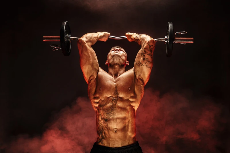 muscular-man-lifting-dumbbell muscular-man-lifting-dumbbell
